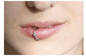 Lip Piercing on College Student