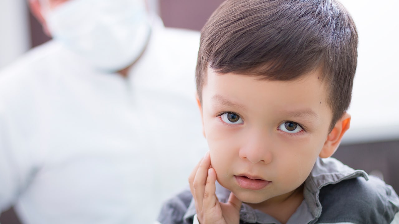 Child with mouth pain