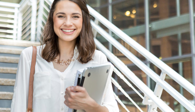 Confident college student on her way to class