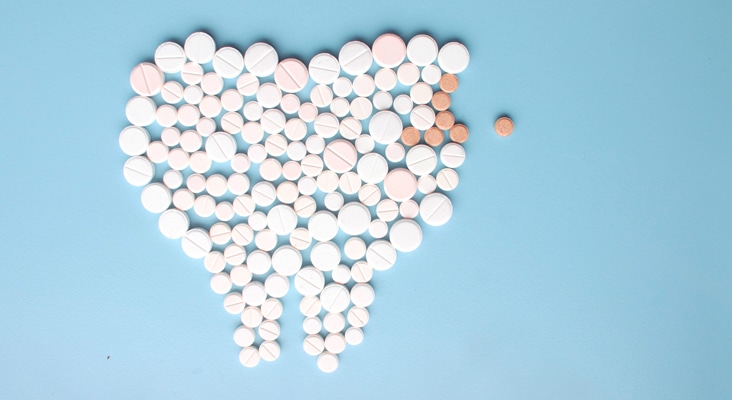 prescription pills in the shape of a tooth