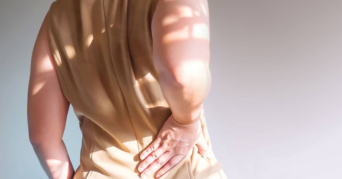 Woman experiencing a musculoskeletal Injury