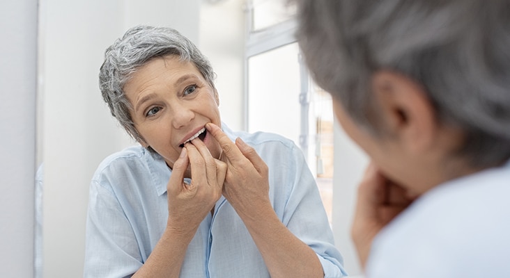 woman flossing