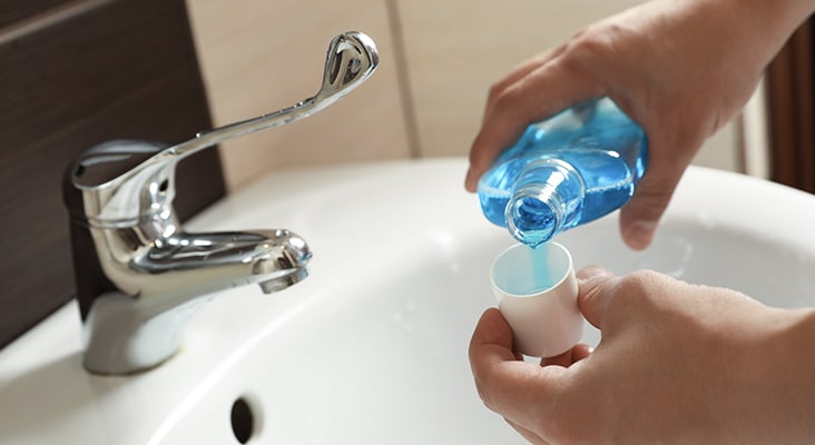 Mouthrinse above sink