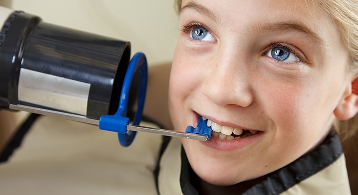 young girl at dentist