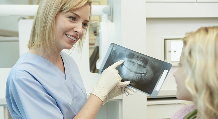 dentist showing xrays