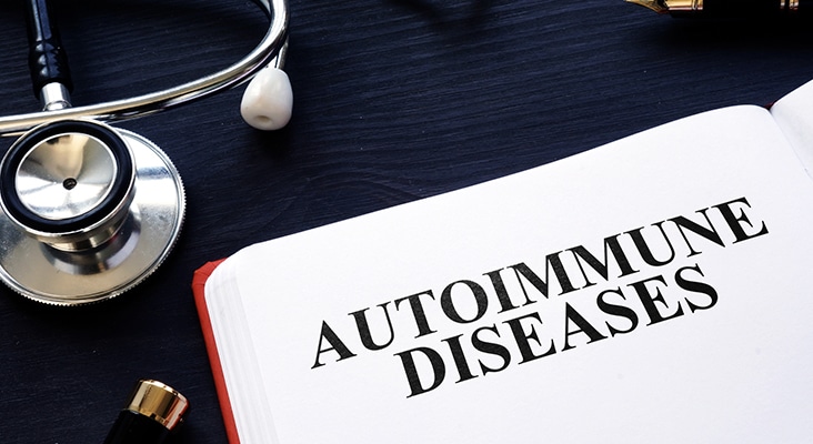 doctors equipment around paper reading autoimmune diseases