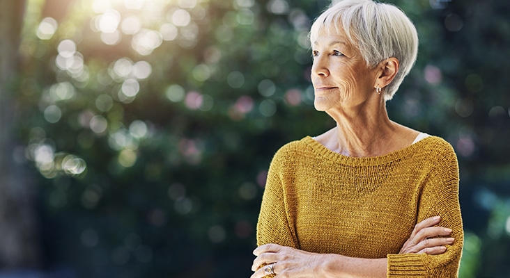 Shot of a confident senior woman looking thoughtful outdoors