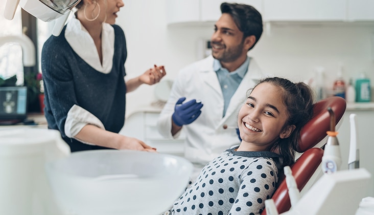 Little girl patient in the dentist's office