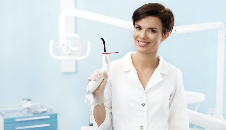 Young female patient visiting dentist office