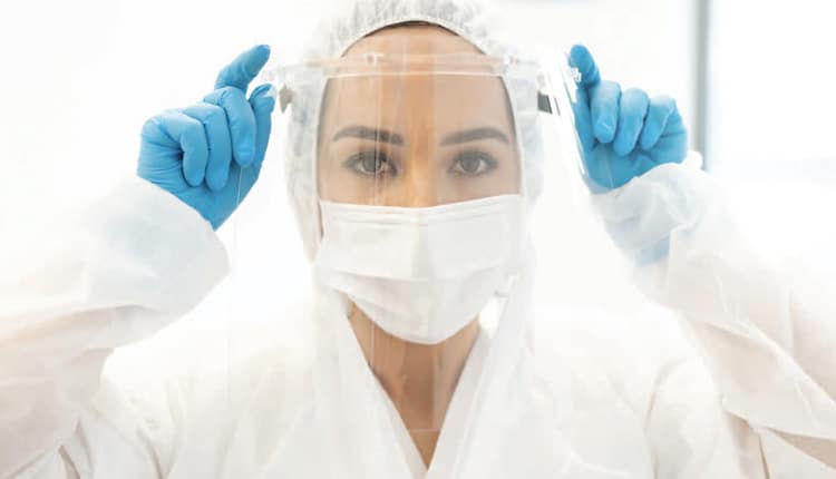 dentist putting on mask