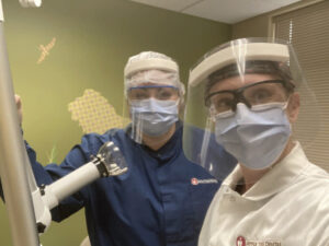 Figure 3. Heather Luebben, ADT, LDH, with dental assistant Malorie Patton, LDA, on the first day the pediatric dental clinic reopened during the global pandemic.