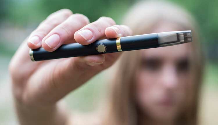 Caries Risk of E Cigarette Use Dimensions of Dental Hygiene