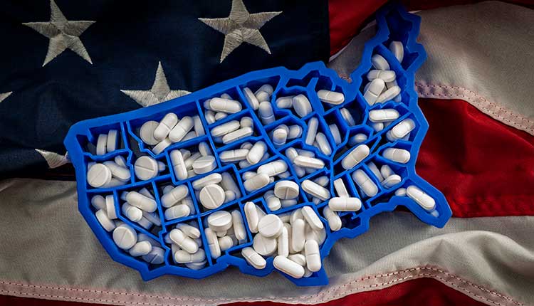 American map covered with opioid painkillers like oxycodone and hydrocodone