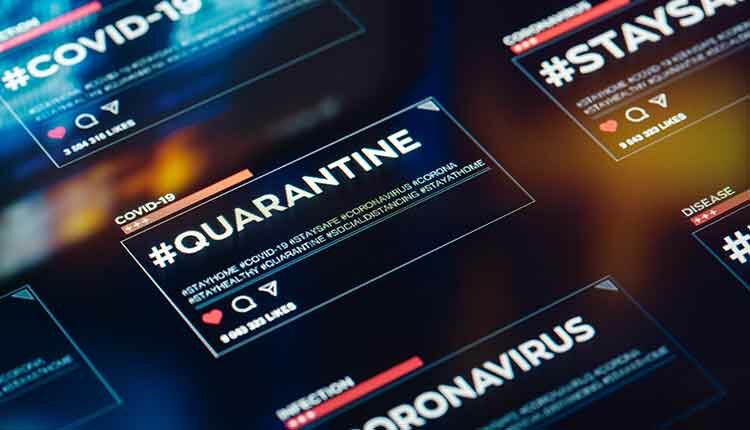 quarantine hashtag for social networks close-up on digital display