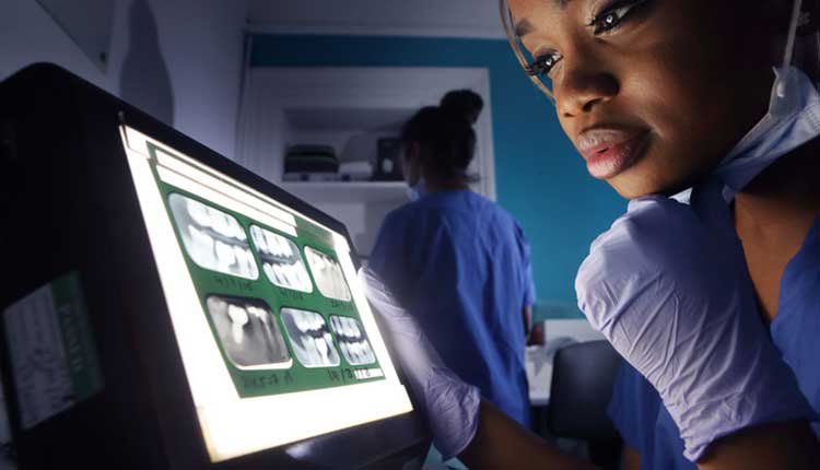 woman looking at x-rays