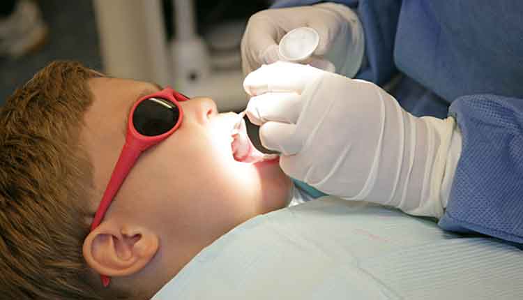 child at the dentist