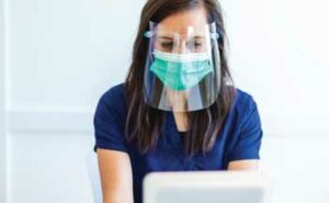 woman with mask and face shield