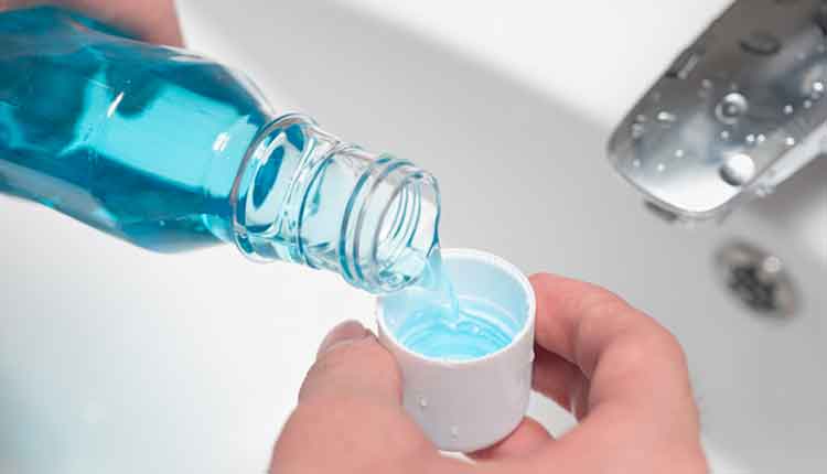 pouring liquid into a cup