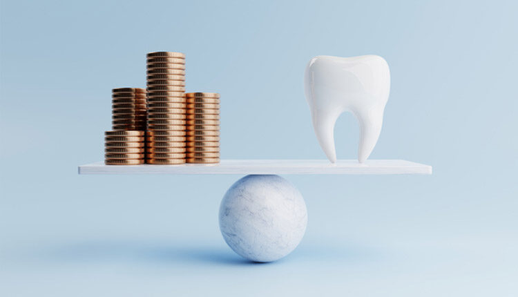 Dental tooth and golden coin on balancing scale on blue background.