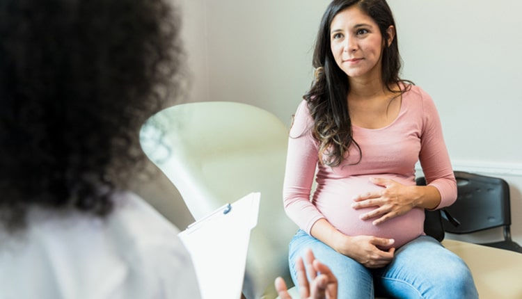 pregnant woman at the doctors