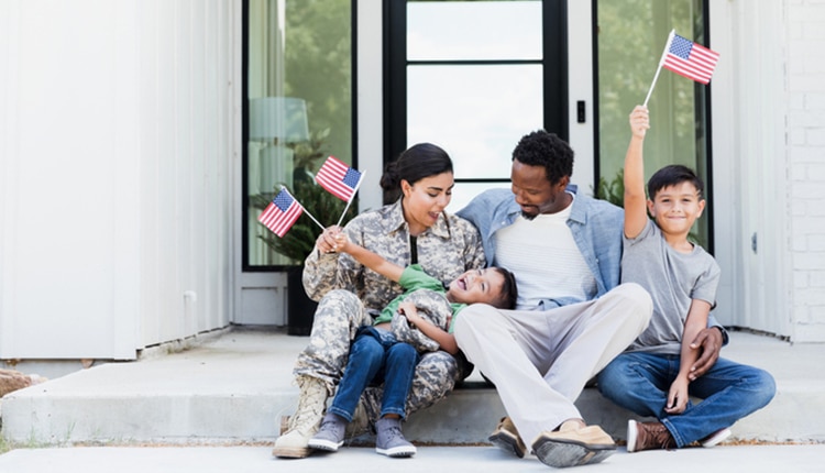 Female soldier is excited to be home with her family