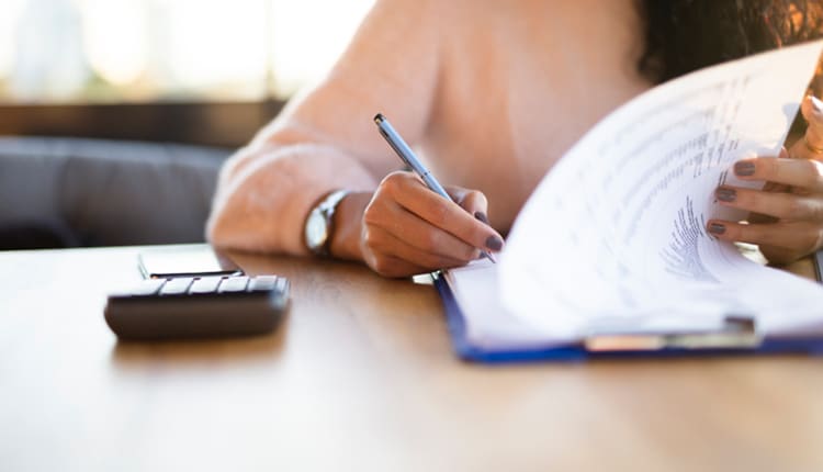 person filling out forms